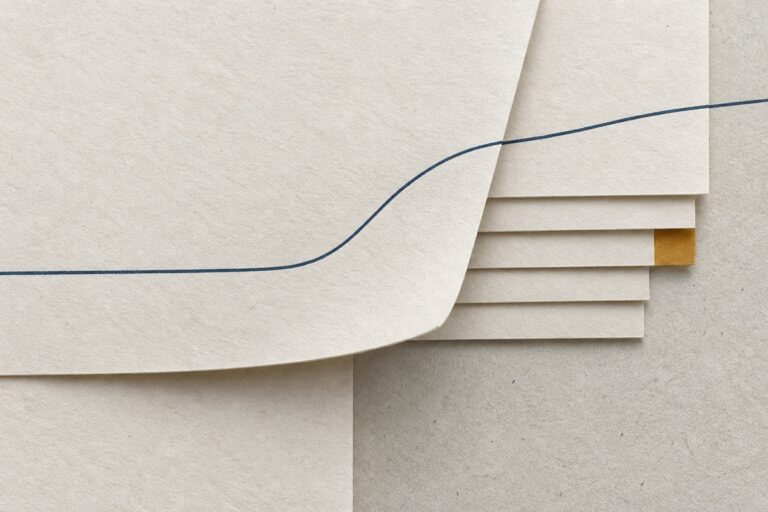 Stacked paper with a single ink line, suggesting an archive path.